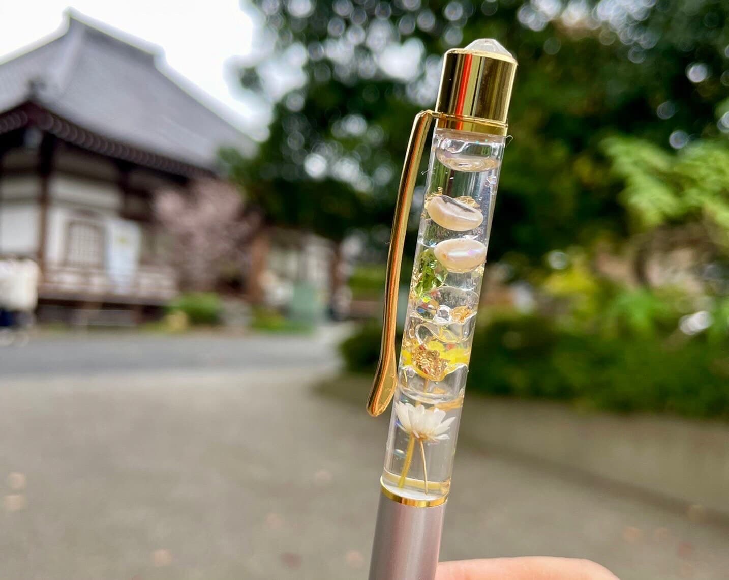 ペリドットとパールで女性らしい優しい作品ができました。